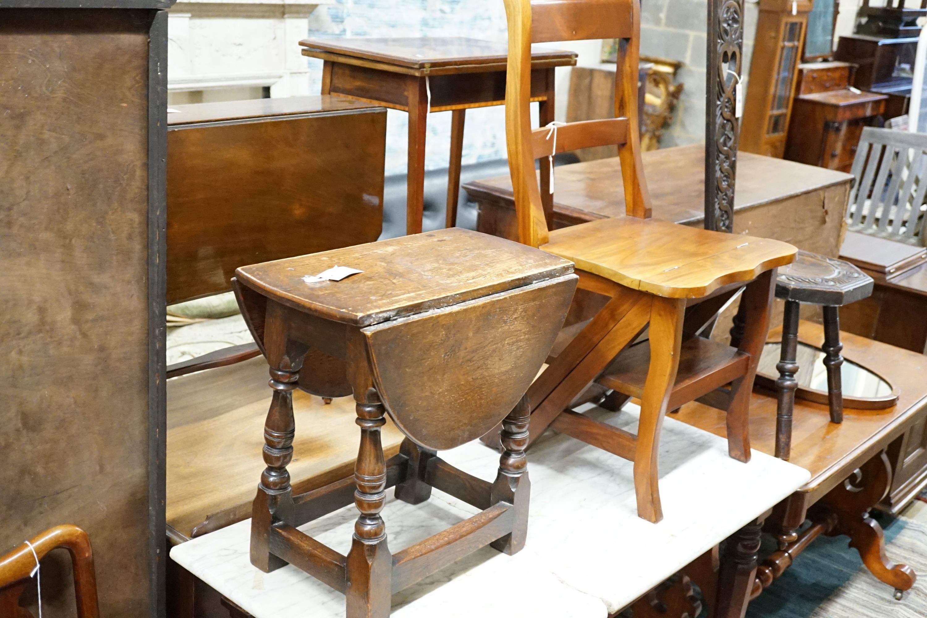 A set of library steps / chair and a small oval oak gateleg coffee table